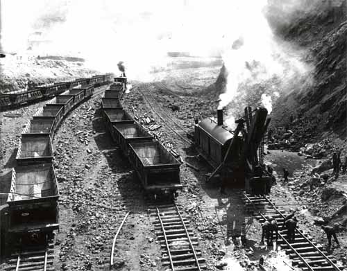 Ore Cars and Steam Shovel at Sunrise