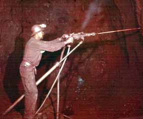 Miner Drilling at Sunrise